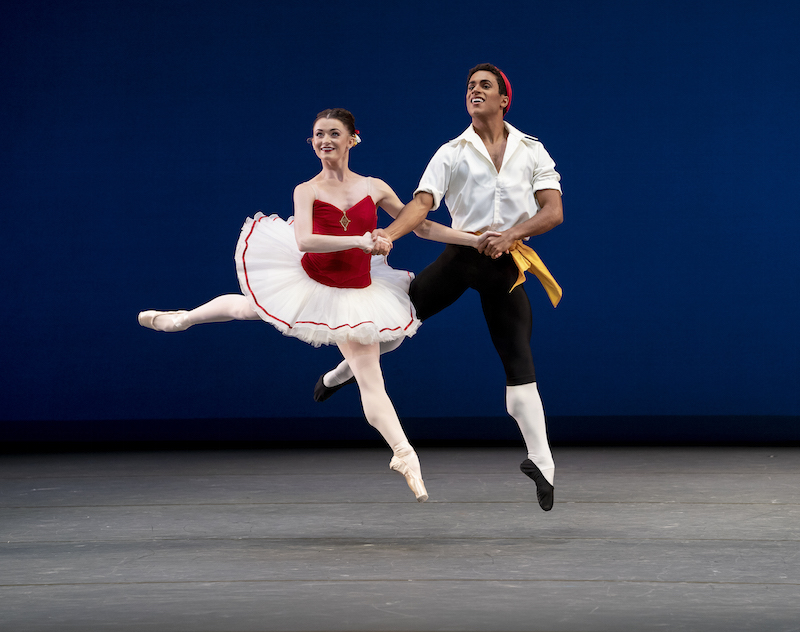 Marcelino and Anna Rose hold hands while jumping in saute