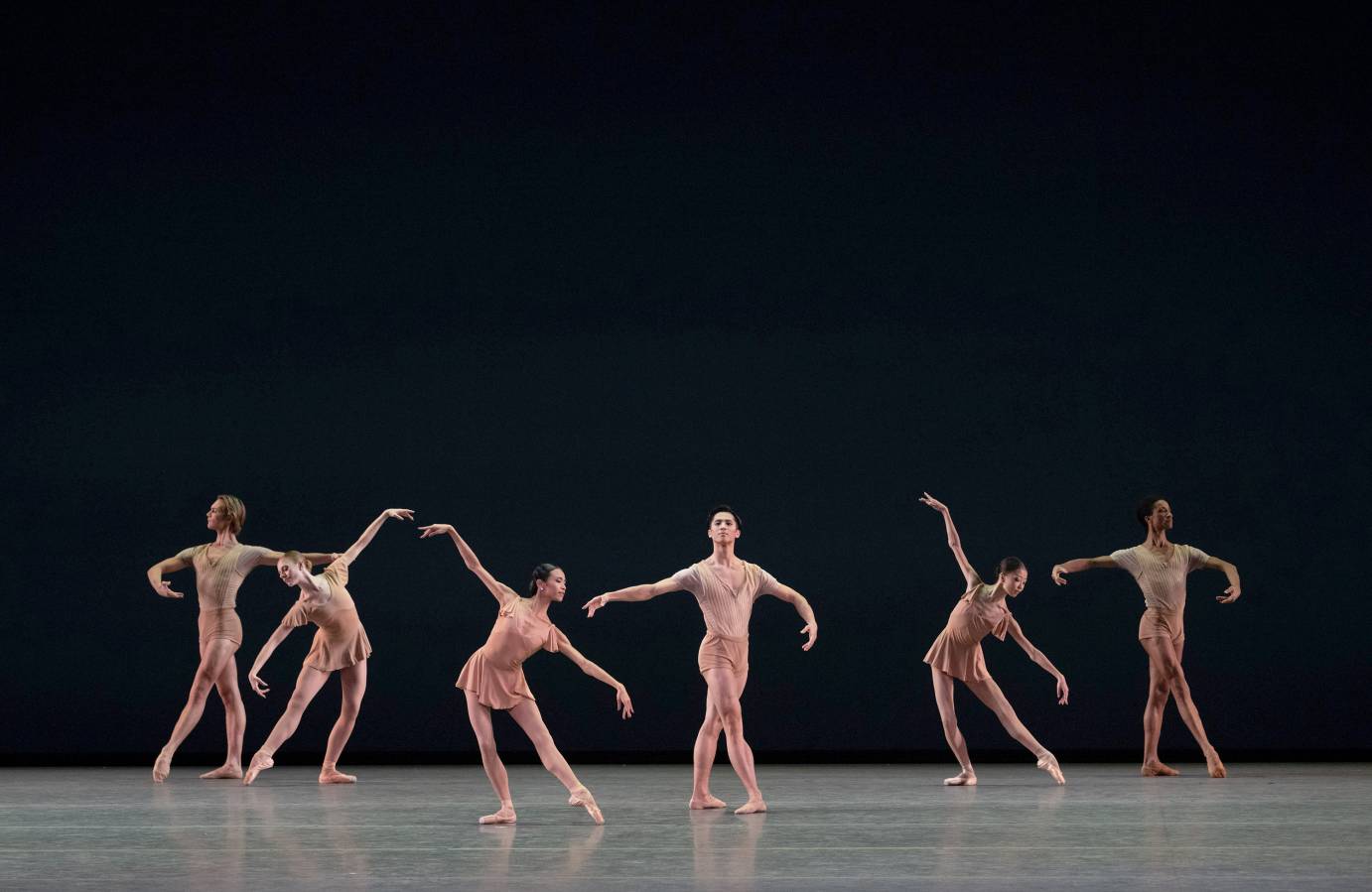 6 dancers in tendu, torso's inclined in different directions