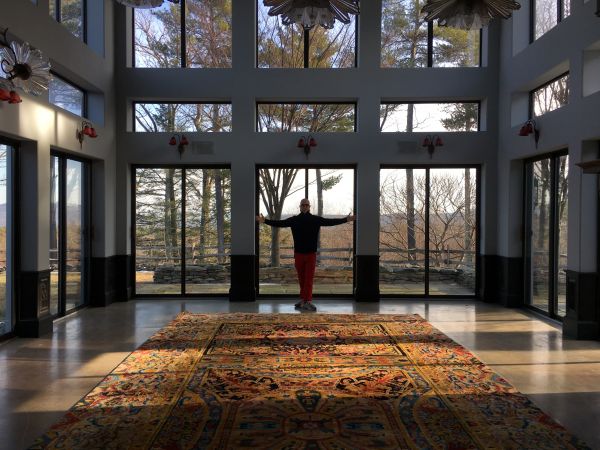 Stephen Petronio in a large, carpeted room with floor to ceiling windows at Crow's Nest.