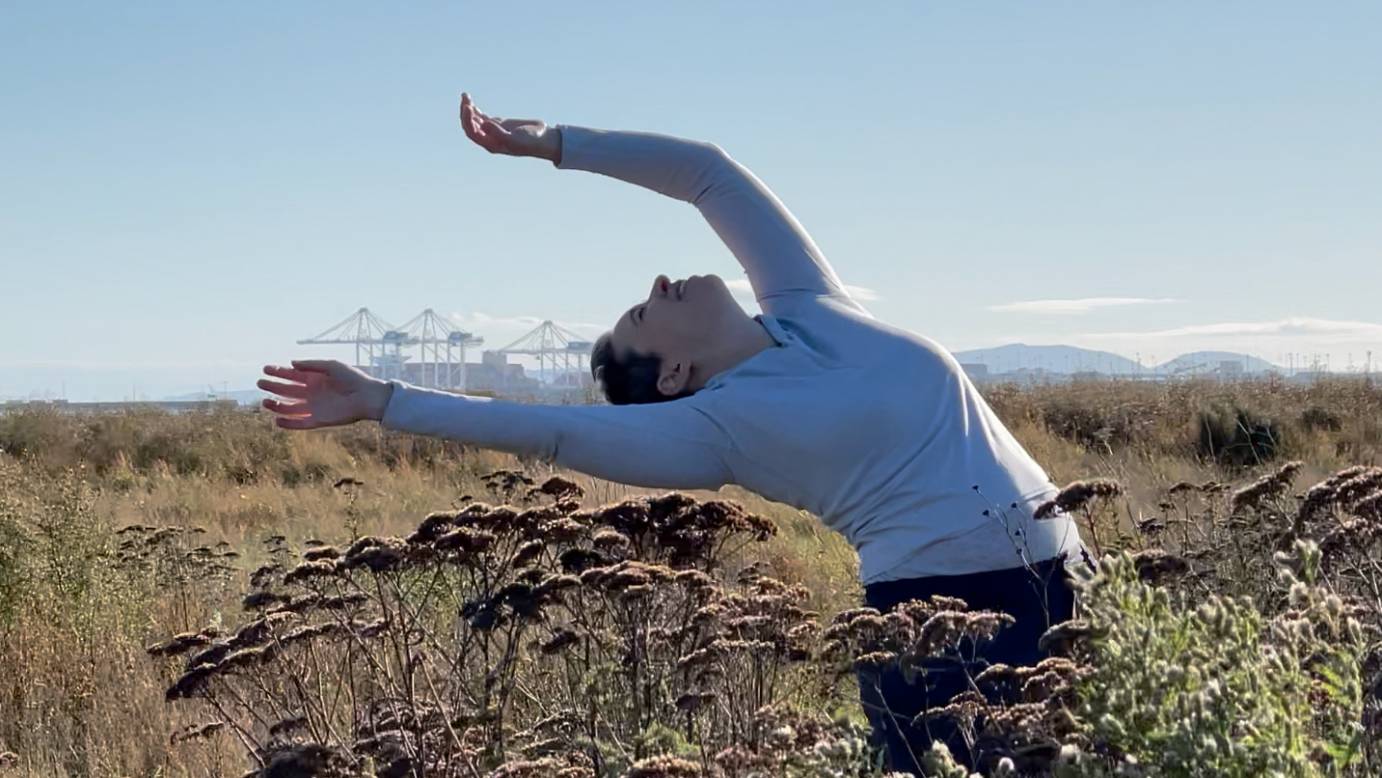 Jody Sperling dancing in the fields. 