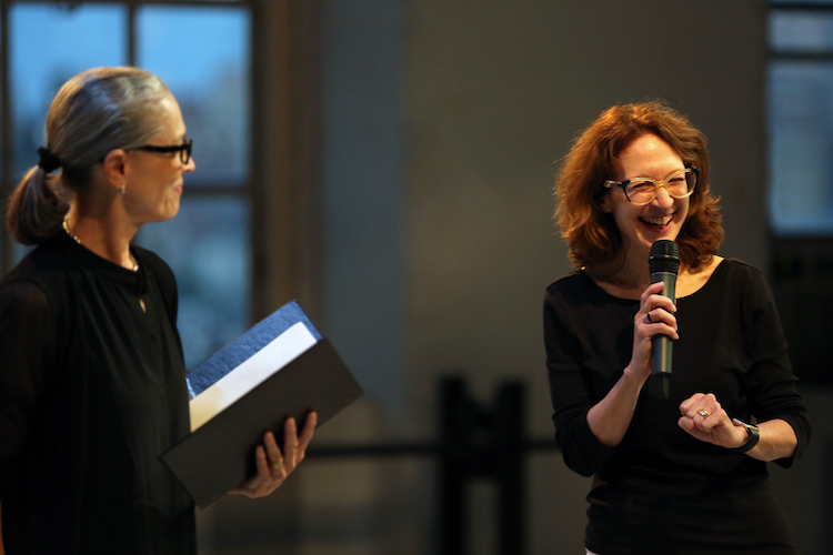 to the left Janet Eilber artistic director of the Graham Co listens to Ms Gonzalez of the De Mille working group in an interview